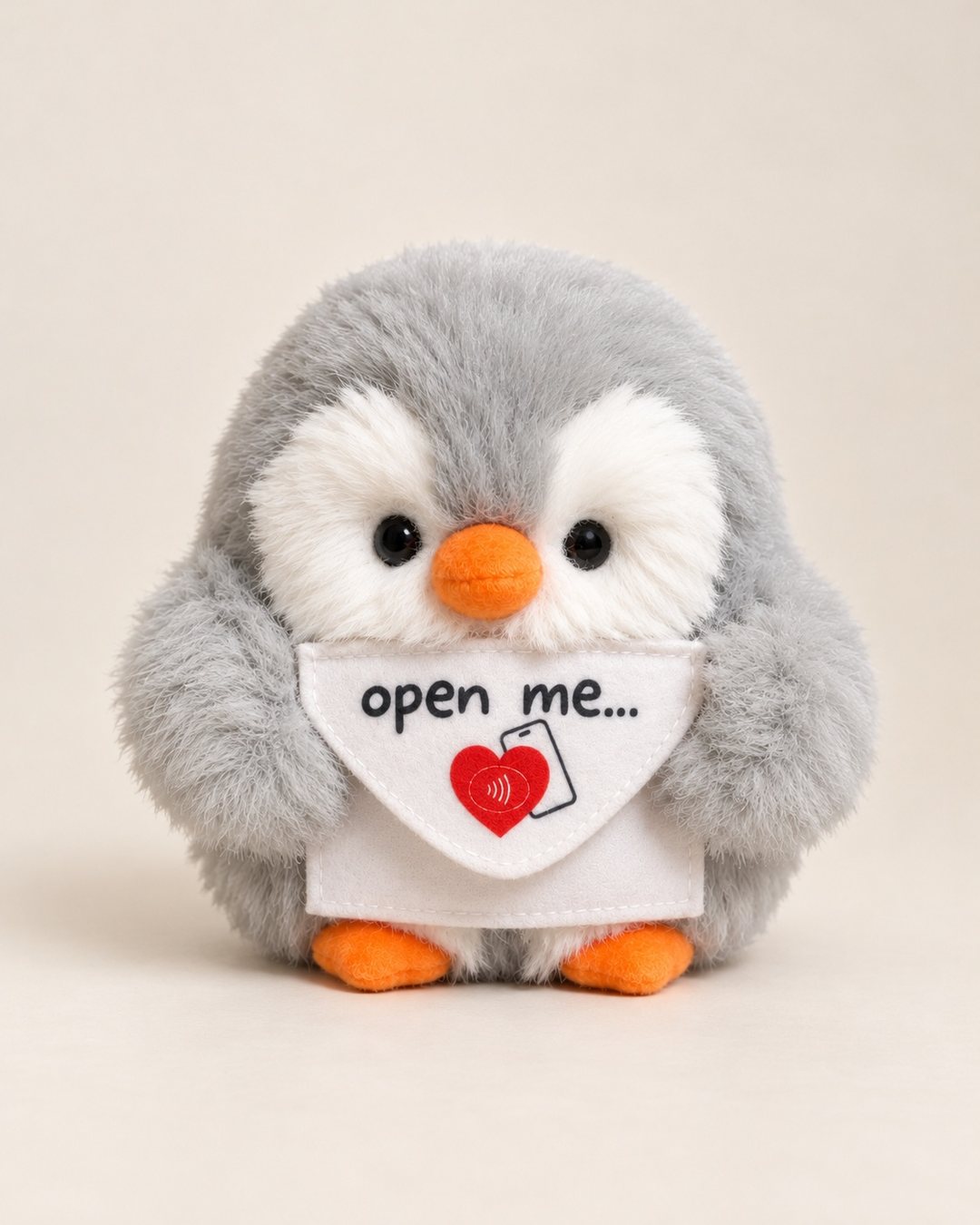 Grey MILUSU penguin facing forward, holding an envelope that reads “open me…” with a red heart